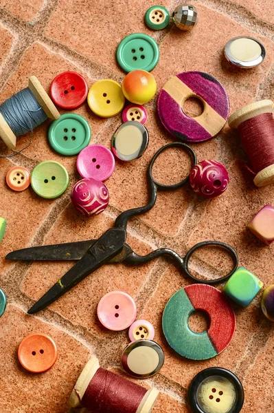 Buttons,beads and scissors — Stock Photo, Image