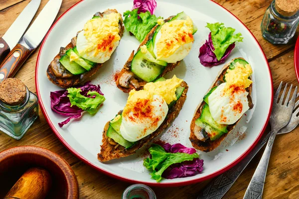 Bruschetta Poached Egg Cucumber Mushrooms Tasty Eggs Benedict Plate — Stock Photo, Image