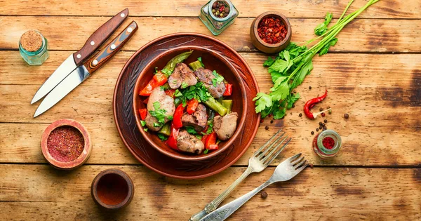 Salad with liver,bell pepper,okra and herbs.Chicken liver salad