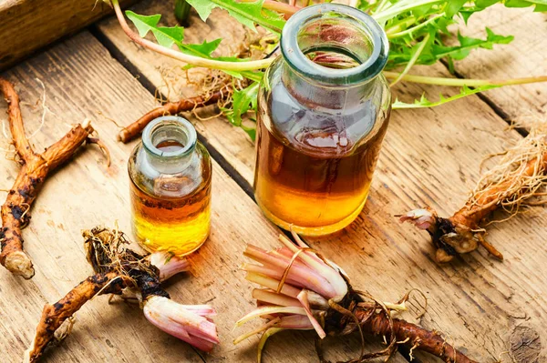 Healing herbs and herbal medicinal roots.Extract of dandelion.Taraxacum,medicinal plants.Dandelion root.