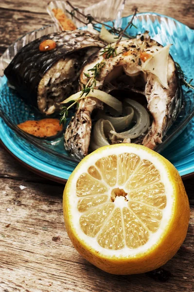 Piece of fragrant roasted fish — Stock Image Piece of fragrant roasted fish Royalty Free Stock Images