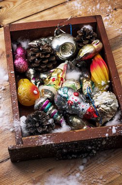 Christmas decorations in the old wooden box clipart