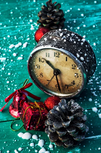 Old clock with Christmas decorations — Stock Photo, Image