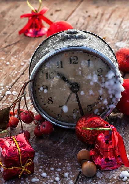 Old-fashioned clock and Christmas toy — Stock Photo, Image