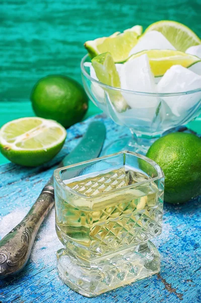 Alcoholic cocktail with additions of lime — Stock Photo, Image