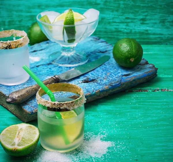Alcoholic cocktail with additions of lime — Stock Photo, Image
