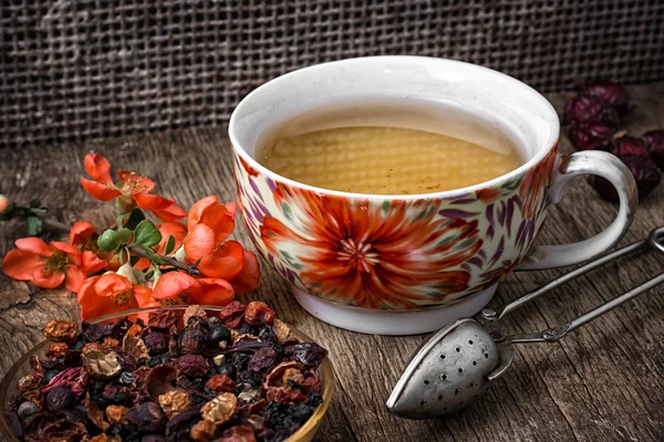 Porcelain cup of fragrant tea for medicinal herbs in retro style — Stock Photo, Image