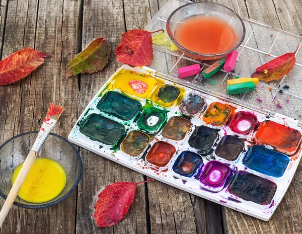 Paint on the autumn table — Stock Photo, Image