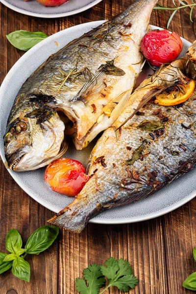 Delicious and elegant seafood dish with seasonal fruits on wooden surface, perfect for gourmet dining.