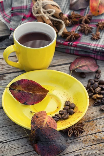 Black coffee in yellow cup — Stock Photo, Image