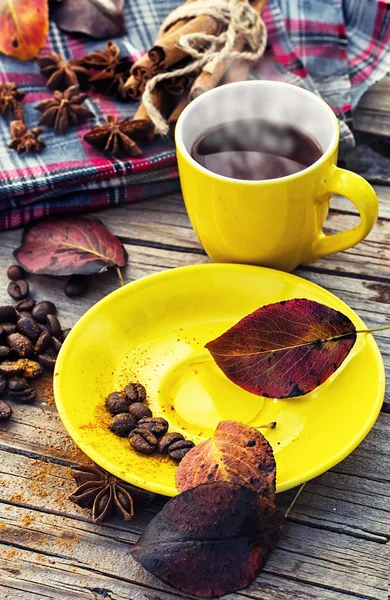 Black coffee in yellow cup — Stock Photo, Image