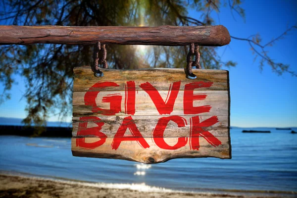 Give back motivational phrase sign