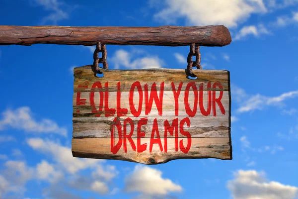 Segui i tuoi sogni frase motivazionale segno — Foto Stock