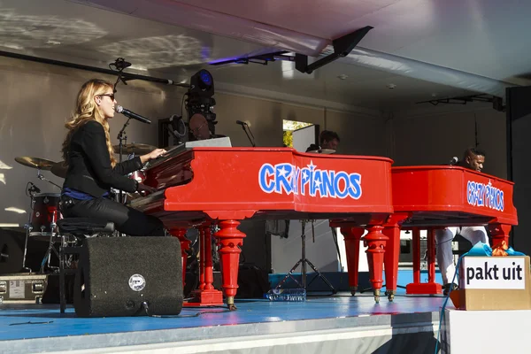 Bright red pianos — Stock Photo, Image