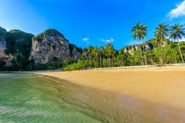Tonsai beach  - about 5 minutes walk from Railay Beach - at Ao Nang - paradise coast scenery in Krabi province, Thailand - Tropical travel destination clipart