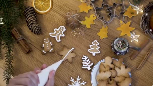 Chef Decorates Cream Christmas Cookies New Year Decorations General Plan — стоковое видео
