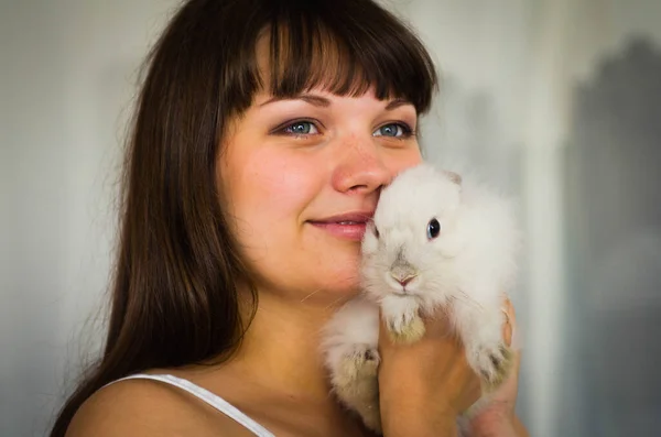 Beautiful Girl Hugs Fluffy Rabbit Portrait Studio Shooting — Stock Photo, Image