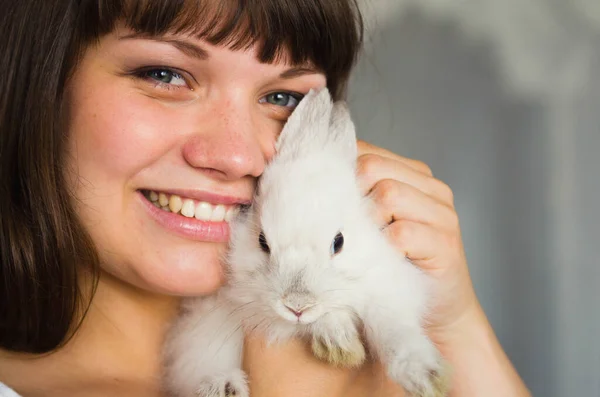 Beautiful Girl Hugs Fluffy Rabbit Girl Smiles Face Close — Stock Photo, Image