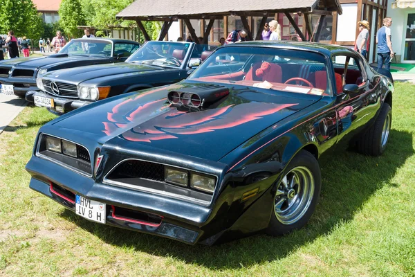 PAAREN IM GLIEN, GERMANY - MAY 19: Pontiac Firebird Trans Am (1977). The Pontiac Firebird is an automobile which was built by the Pontiac division of General Motors between 1967 and 2002, "The oldtime — Stock Photo, Image