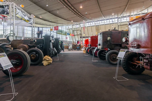 Various old tractor standing in a row. — Stock Photo, Image