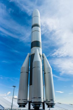 Model of launch vehicle Ariane 6 (A64) against the blue sky.  clipart