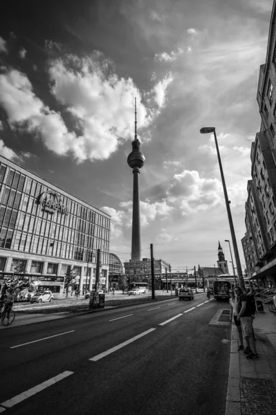 City landscape. Galeria Kaufhof at Alexanderplatz and Berlin TV Tower. GALERIA Kaufhof GmbH - the largest retail store Metro AG. Black and white. — Stock Photo, Image