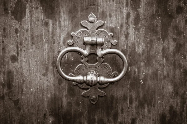 Ancient door handle. Sepia. Stylization. — Stock Photo, Image