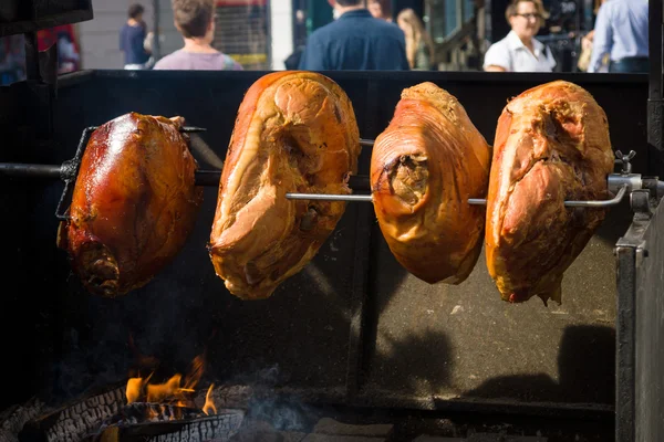 Pork leg on the skewer. — Stock Photo, Image