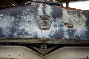 Fragment of rusted body of full-size pickup truck Ford F100 clipart