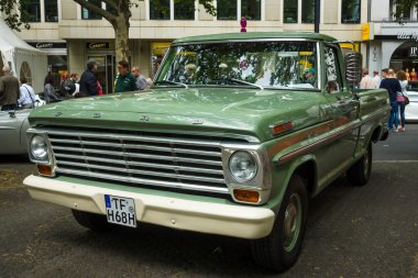 Full-size pickup truck Ford F100 (fifth generation), 1968. The Classic Days on Kurfuerstendamm. clipart