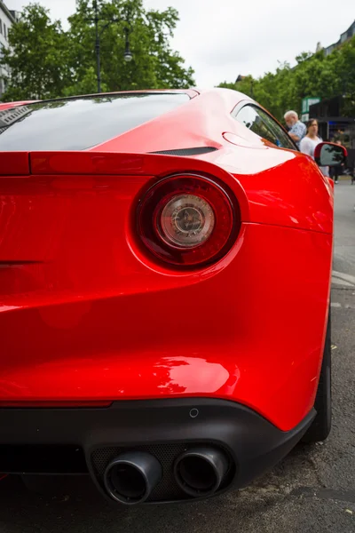 Fragment of sports car Ferrari F12berlinetta. Rear view. The Classic Days on Kurfuerstendamm. — ストック写真