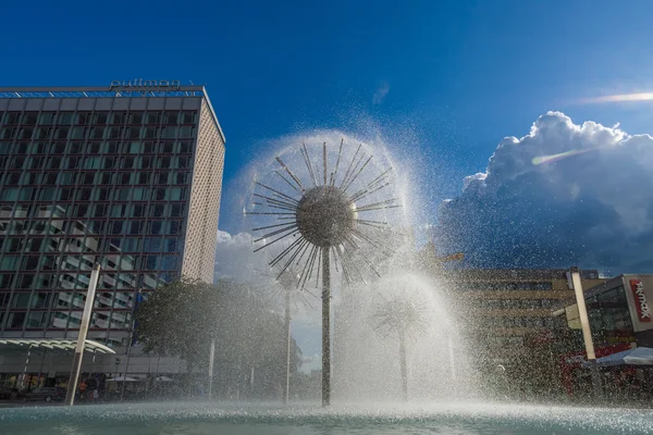 A beautiful fountain in the form of a ball on the square in the old town — Stok fotoğraf