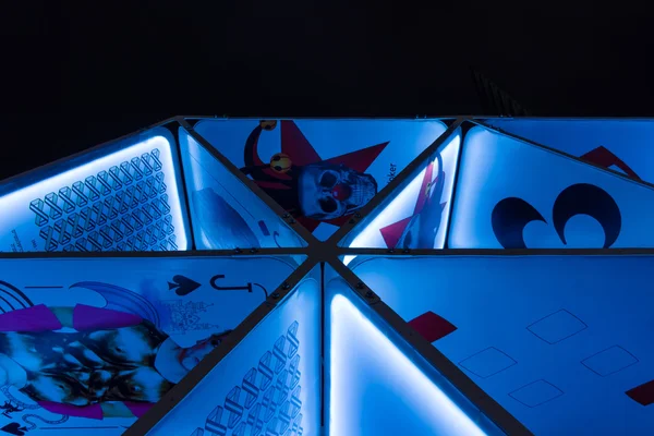 Fragment of an art installation "House of Cards" on Potsdamer Platz. The annual "Festival of lights" — Stock Photo, Image