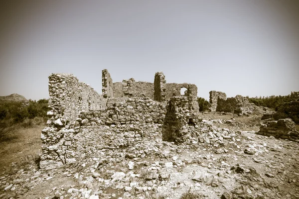 Antika ruiner av Aspendos. Turkiet. Stilisering. Sepia. Vinjettering. — Stockfoto