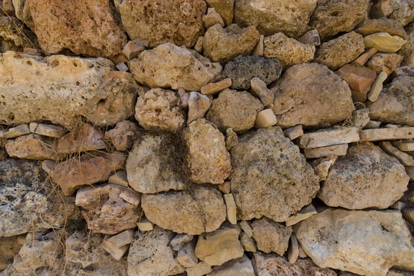 Un viejo muro de piedra. antecedentes . — Foto de Stock