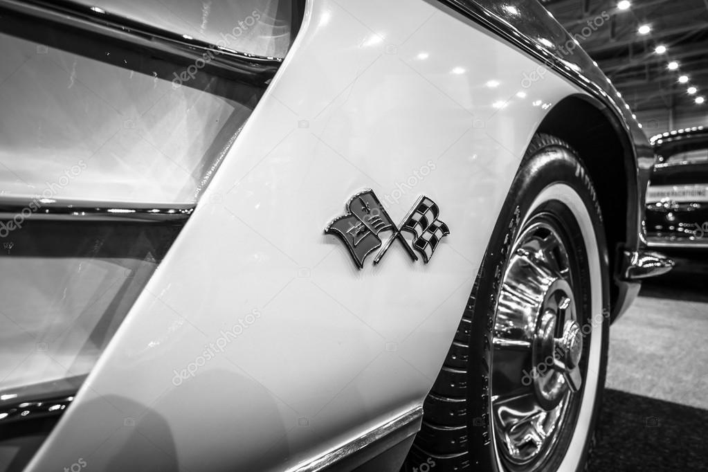 MAASTRICHT, NETHERLANDS - JANUARY 14, 2016: Detail of a sports car Chevrolet Corvette (C1), 1960. Black and white. International Exhibition InterClassics & Topmobiel 2016