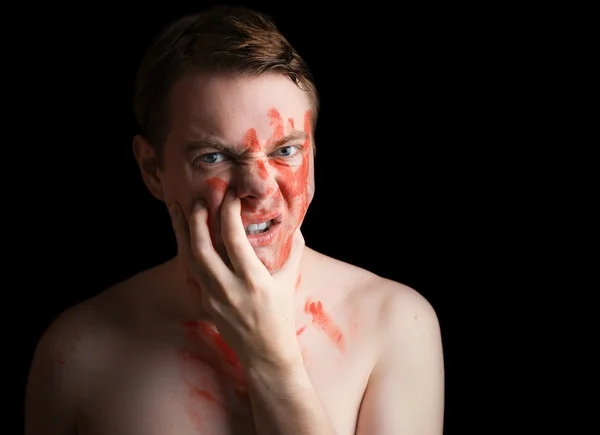 stock image Man with paint on his face.