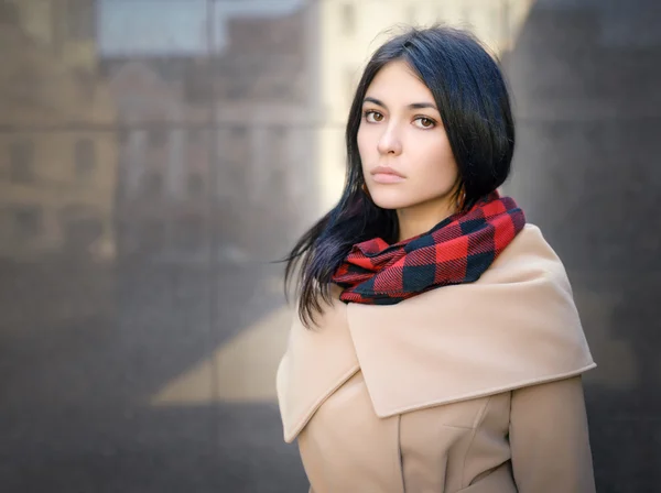 Young woman in a coat. — Stock Photo, Image