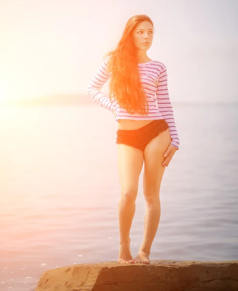 Girl in a striped T-shirt. — Stock Photo, Image