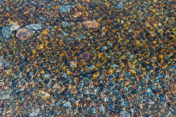 Deniz dibinde çakıl taşları ile birlikte. — Stok fotoğraf