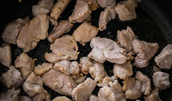 Fried meat on a pan. — Stock Photo, Image