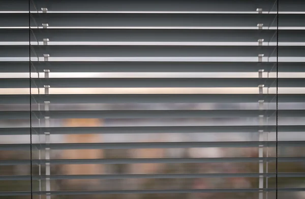 White venetian blinds.