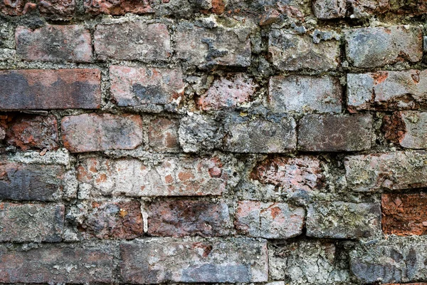 Vecchio e rotto muro di mattoni . — Foto Stock