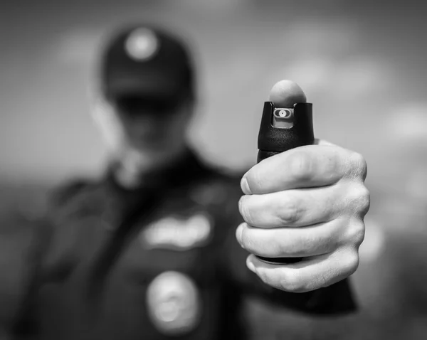 Detalj av en polis. Stockbild