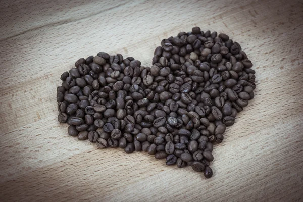 Chicchi di caffè cuore isolato — Foto Stock