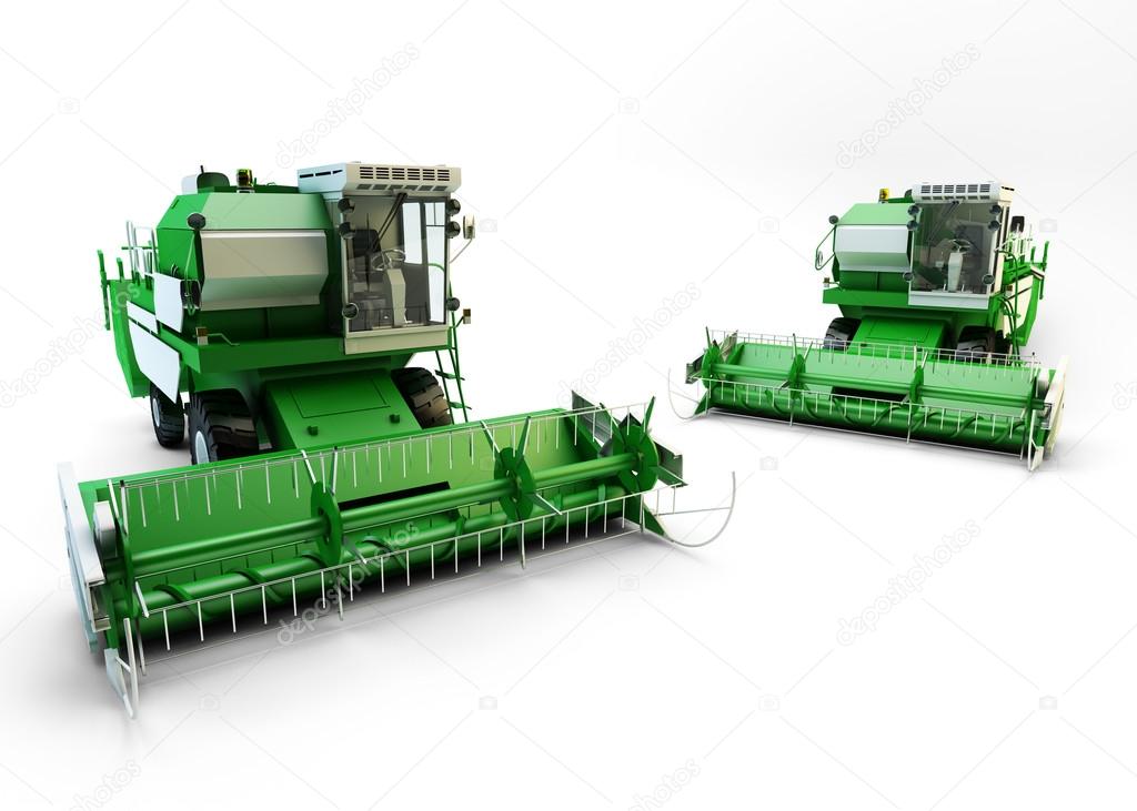Two Green agricultural combine-harvesters isolated on white
