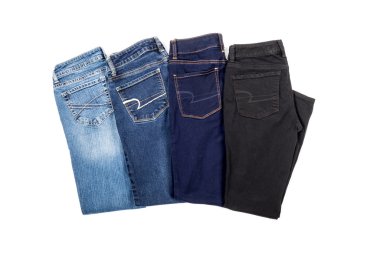 Four Pairs of Jeans Isolated on White clipart