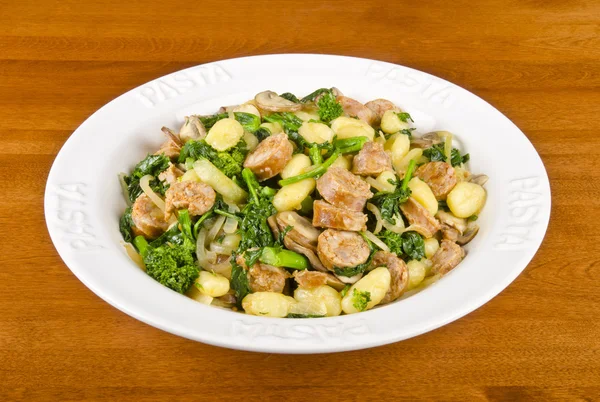 Gnocchi with Rapini and Italian Sausages — Stock Photo, Image