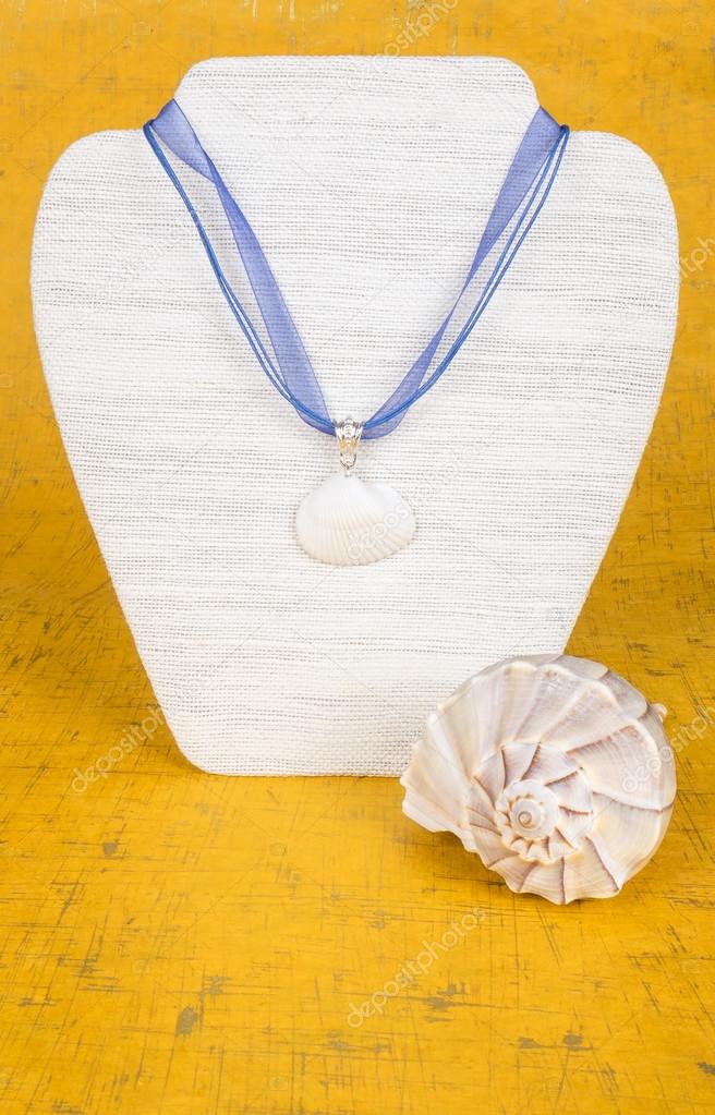 Seashell Necklace on a Display Stand