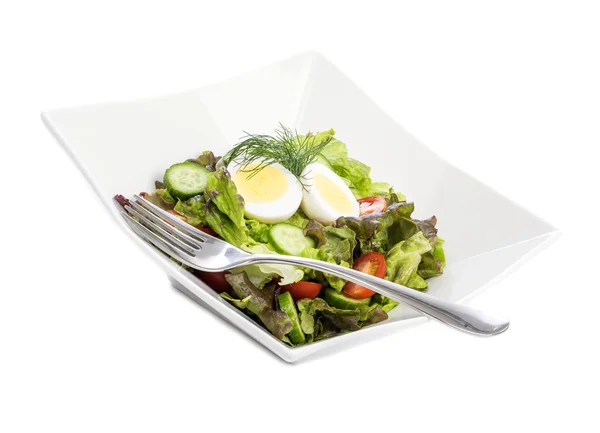 Salad with Hard-boiled Egg on Top — Stock Photo, Image